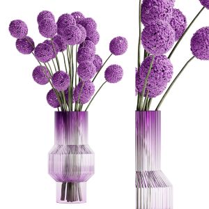 Spherical Bouquet Inserted Into A Glass Vase