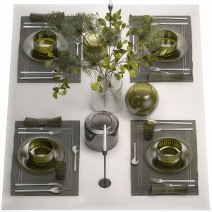 Table Setting For 4 Persons With A Bouquet