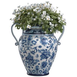 A Flower Bed Of White Flowers In An Italian Vase