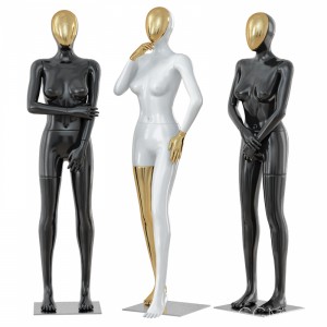 Three Female Mannequin With A Golden Face 41