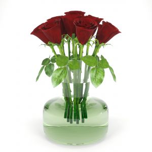 Two Small Bouquets Of Roses In A Glass Vase